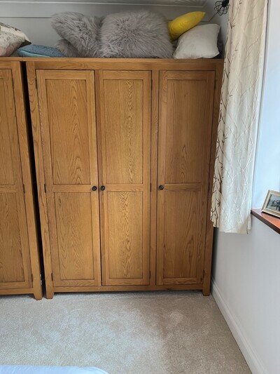 Solid oak wardrobe with 3 doors, 5 shelves on one side and 1 shelf and hanging r